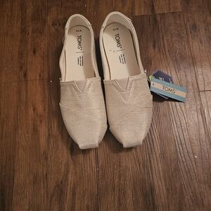 TOMS Women's Gold  Slip-On Shoes